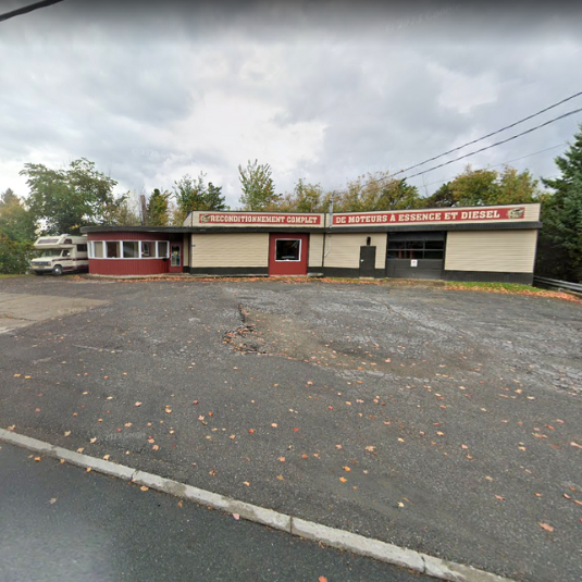Vue extérieure de l'Atelier d’Usinage Moteur de Beauce à Saint-Georges, spécialisé en réparation et usinage de moteurs diesel et essence.